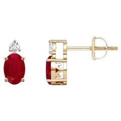ANGARA Natural Oval 0.50ct Ruby Stud Earrings with Diamond in 14K Yellow Gold