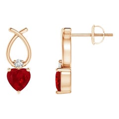 ANGARA Pendientes de rubí natural en forma de corazón de 0,60 ct con diamante en oro rosa de 14 quilates
