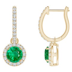 Orecchini con smeraldo rotondo Nature e diamante aureolato in oro giallo 14K (5 mm)