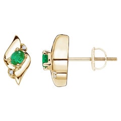 Orecchini con smeraldo ovale naturale e diamanti in oro giallo 14K (4x3mm)