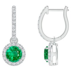 Boucles d'oreilles émeraude ronde naturelle avec halo de diamants en or blanc 14 carats (5 mm)