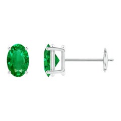 Orecchini a perno con smeraldo ovale solitario naturale da 0,80ct in oro bianco 14 carati