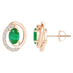 Orecchini con smeraldo naturale fluttuante da 0,80ct e diamante in oro rosa 14K