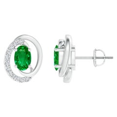 Orecchini con smeraldo naturale fluttuante da 0,80ct e diamante in oro bianco 14K