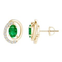 Orecchini con smeraldo naturale fluttuante da 0,80ct e diamante in oro giallo 14K