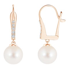 Orecchini con perle d'acqua dolce e diamanti in oro rosa 14K