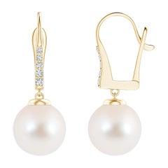 Orecchini con perle coltivate d'acqua dolce e diamanti in oro giallo 14K