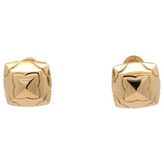 Vintage A pair of 18k yellow gold "Pyramid" ear clips by Bulgari.