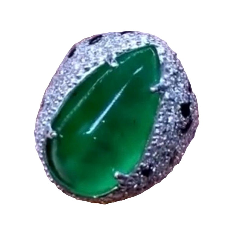 AIG Certified 23.42 Carats Zambian Emerald.  2.91 Carats Diamonds 18K Gold Ring For Sale