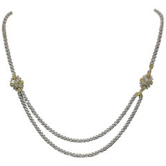 Wunderschöne Halskette aus weißen und gelben Diamanten in 18k Weißgold 