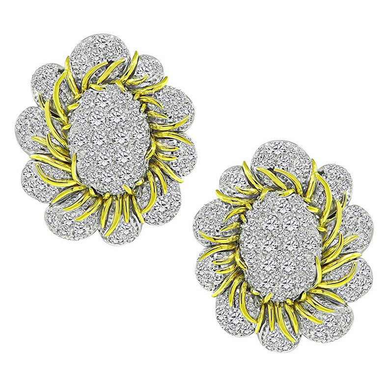 Boucles d'oreilles en platine et or ornées d'un diamant de 6,00ct