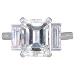 2.57ct Emerald and Baguette Cut Three Stone Ring in Platinum