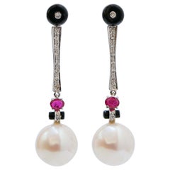 Pearls, Onyx, Rubies, Diamonds, Platinum Dangle Earrings.