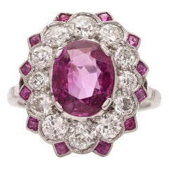 Antique Platinum oval-shaped 2.25 cts. Natural Burma ruby cluster ring 