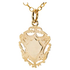 Vintage Circa 1960s Pendentif bouclier et chaîne Belcher moyenne en or jaune 9 carats