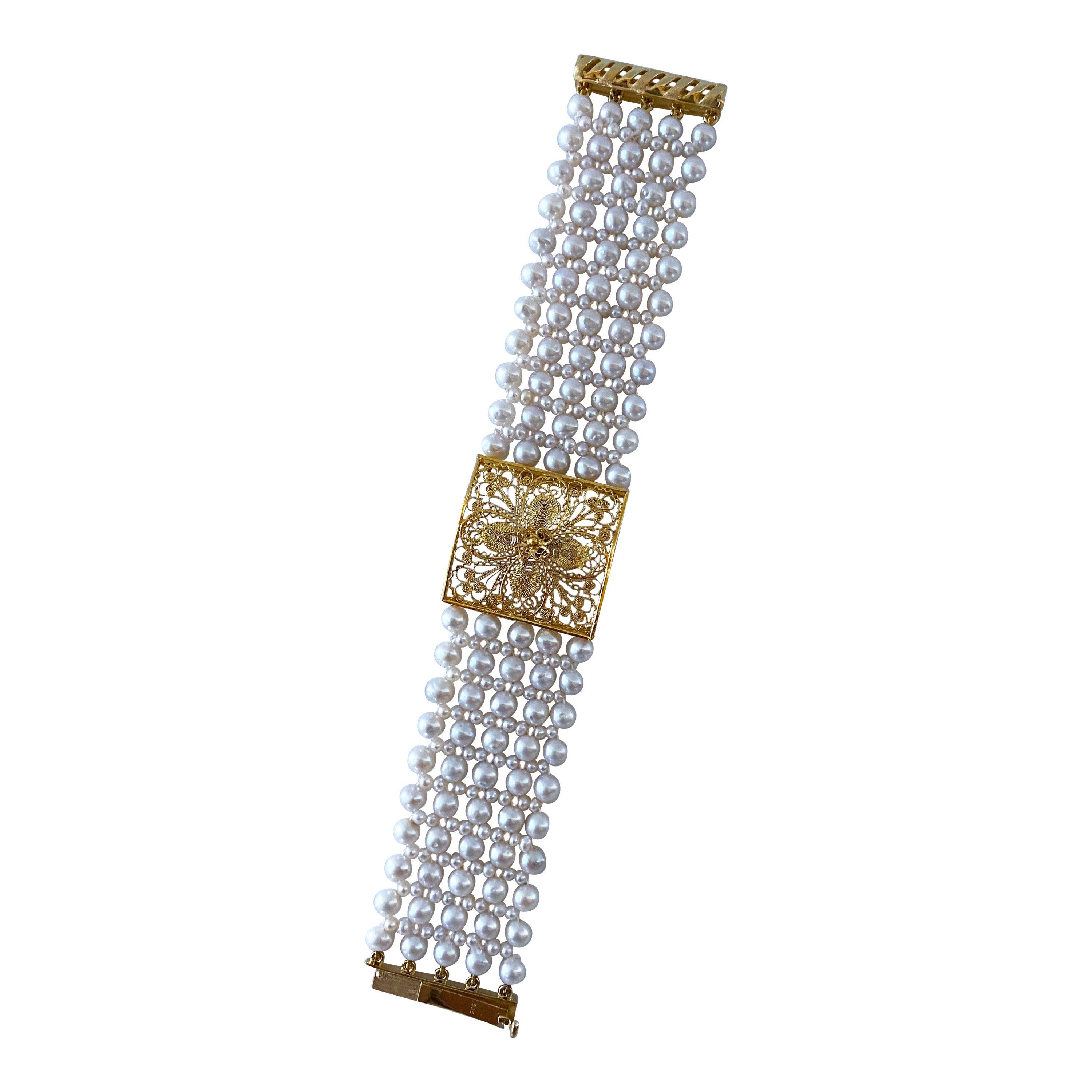Marina J. Pearl Woven Bracelet with 18k Yellow Gold Floral Centerpiece 