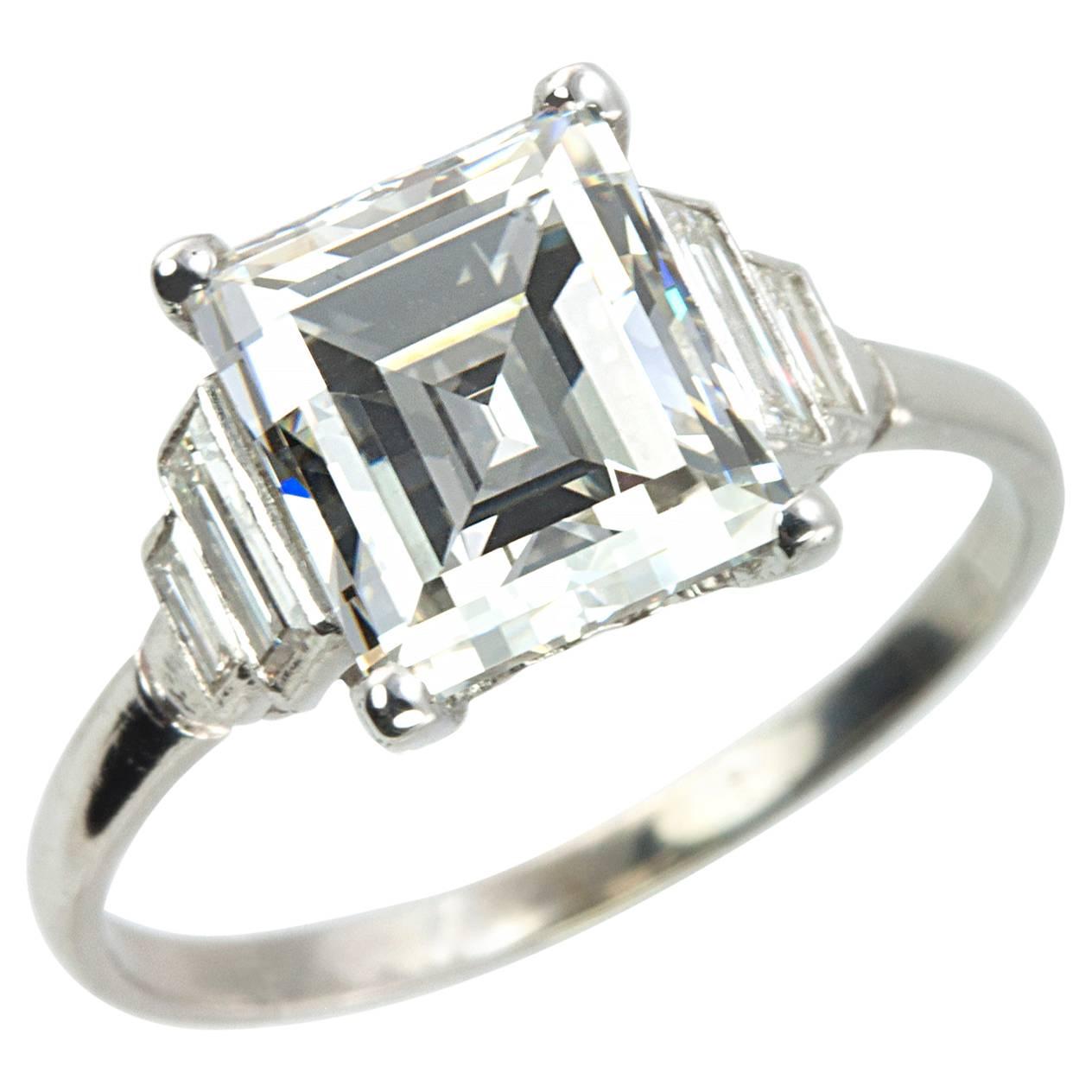 Art Deco 2.90 Carat Emerald Cut Diamond Engagement Ring For Sale