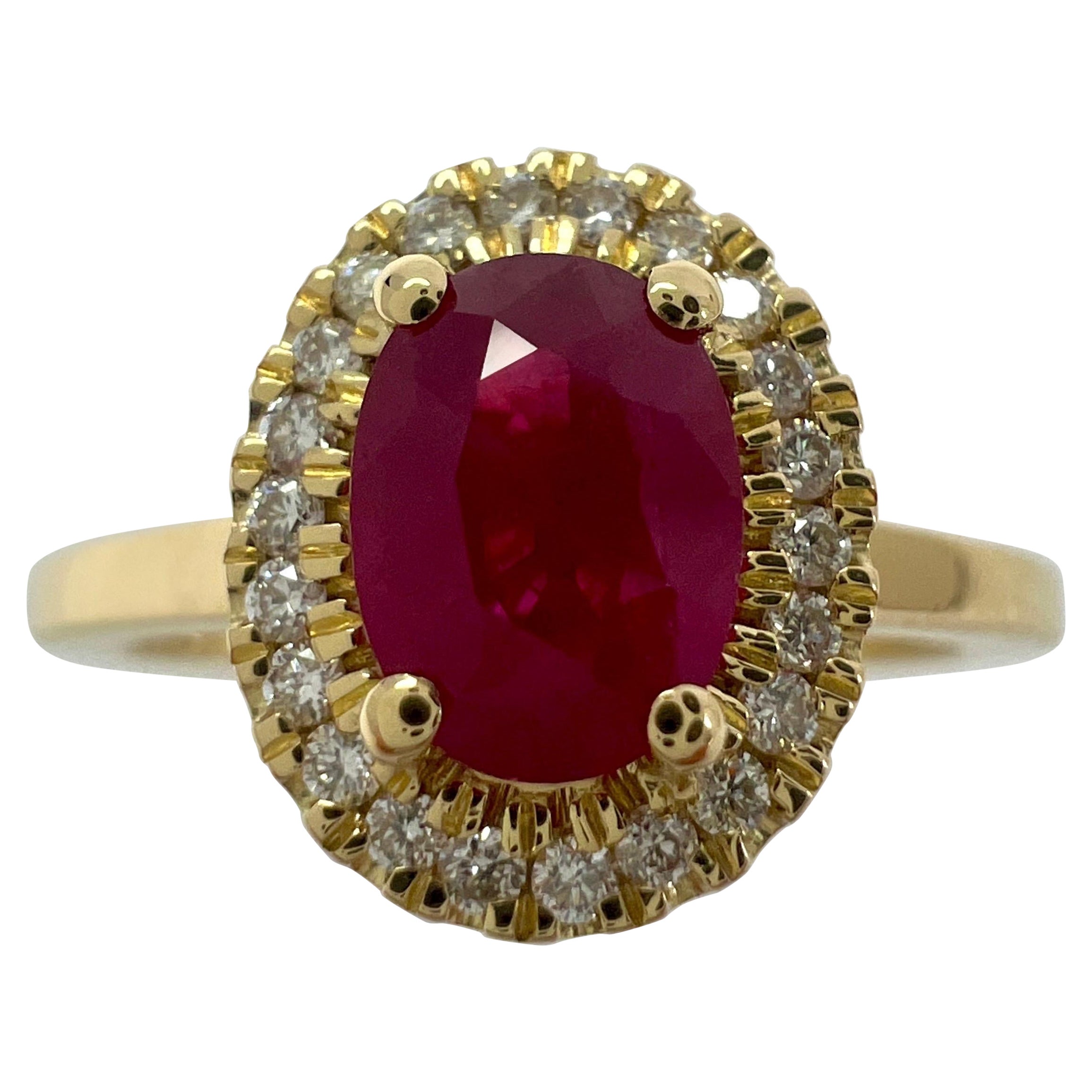 1.06 Carat Deep Red Ruby And Diamond Oval Cut 18k Yellow Gold Halo Cluster Ring For Sale