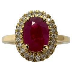1.06 Carat Deep Red Ruby And Diamond Oval Cut 18k Yellow Gold Halo Cluster Ring
