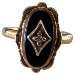 Antiker Ring mit Diamant und Onyx 