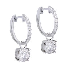 Used Diana M. 14kt white gold drop earrings featuring 1.00 cts tw of round diamonds 