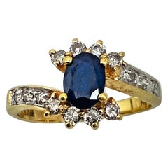 14k Yellow Gold 5mm x 8mm Oval Sapphire 14 Diamonds Ring Size 7 1/4