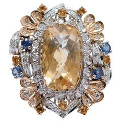Ring aus 14 Karat Weißgold und Roségold mit Topas, Saphiren, Diamanten.