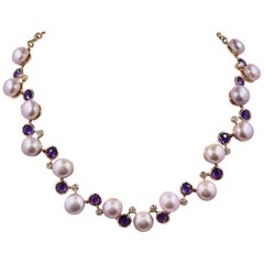 Magnifique collier de perles roses, améthystes et diamants 18 carats