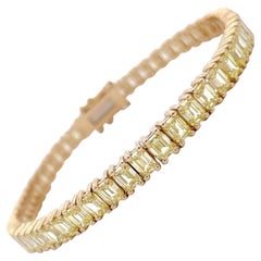 Bracelet tennis fantaisie en or 14 carats avec diamants jaunes taille émeraude jaune 12,55 carats