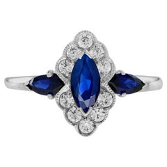 Marquise Blue Sapphire and Diamond Halo Ring in 14K White Gold