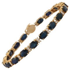 Bracelet tennis en or jaune massif 14 carats avec saphir bleu profond et diamants