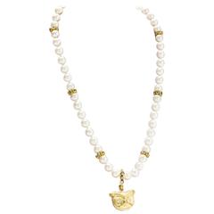  gold owl pendant  Pearl necklace with sapphire spacers 