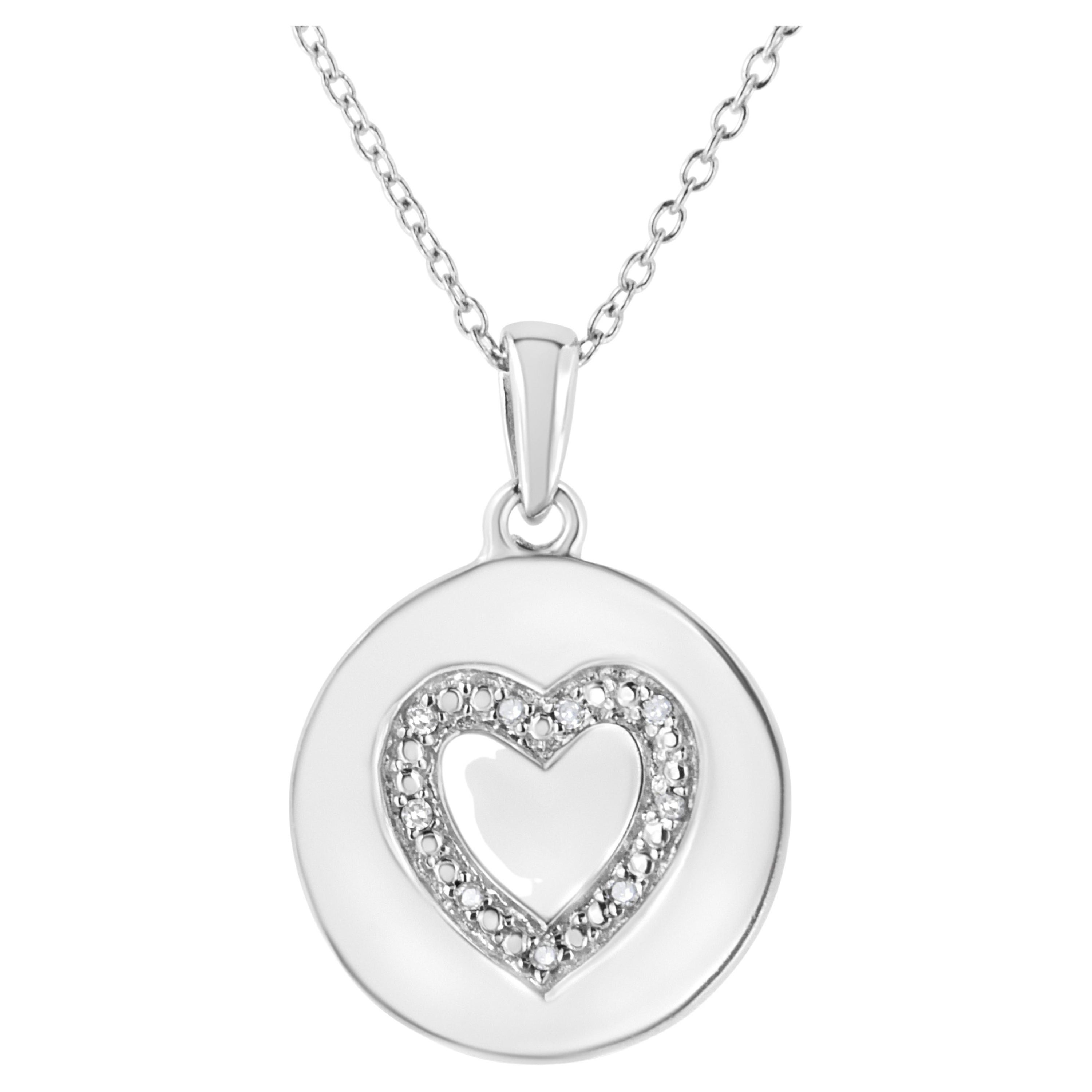 .925 Sterling Silver Prong-Set Diamond Accent Heart Emblemed Pendant Necklace For Sale