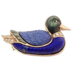 A Van Cleef & Arpels duck brooch.