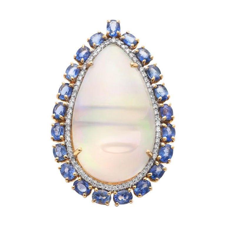 Äthiopischer Opal in Birnenform, blauer Saphir und Diamantring aus 18 Karat Gelbgold