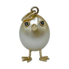 Australian 18Kt gold chick pendant with Australian pearl and black diamonds Made in Italy