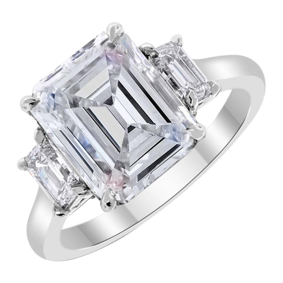 Beauvince Ariel 3 Stone Ring (5.82 ct Emerald Cut IVVS2 IGI Diamond) in Platinum For Sale
