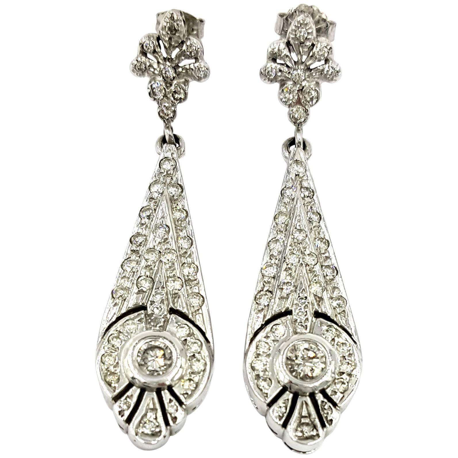 Stunning Circa 1950s 18kt Gold Featuring 3 Carats of Diamonds in Dangle Earrings For Sale