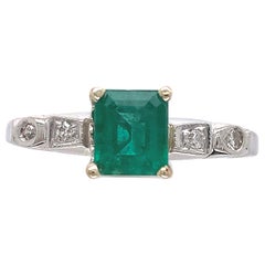 Vintage Platinum + 14K .82ct Emerald & Diamond Ring