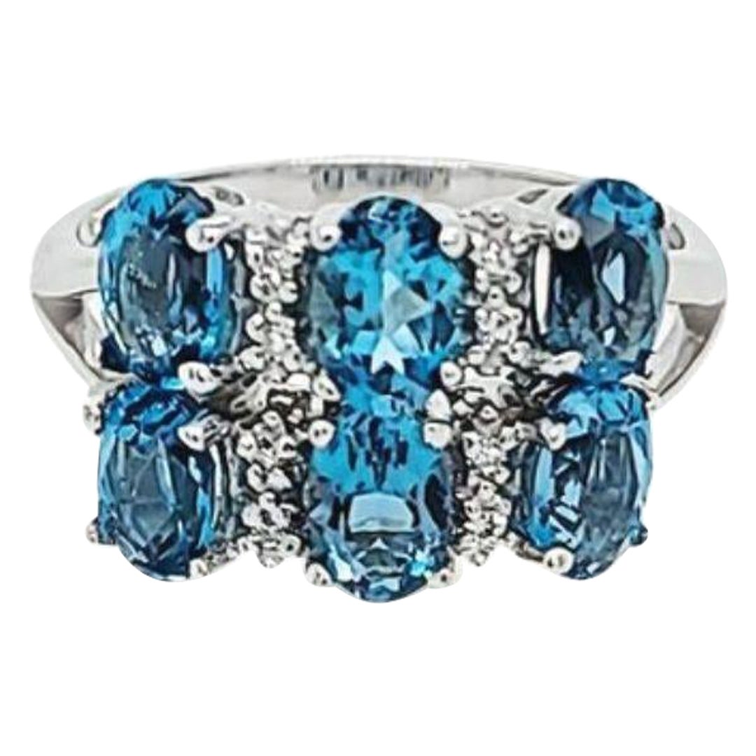 Blue Topaz and Diamond Cluster Ring For Sale