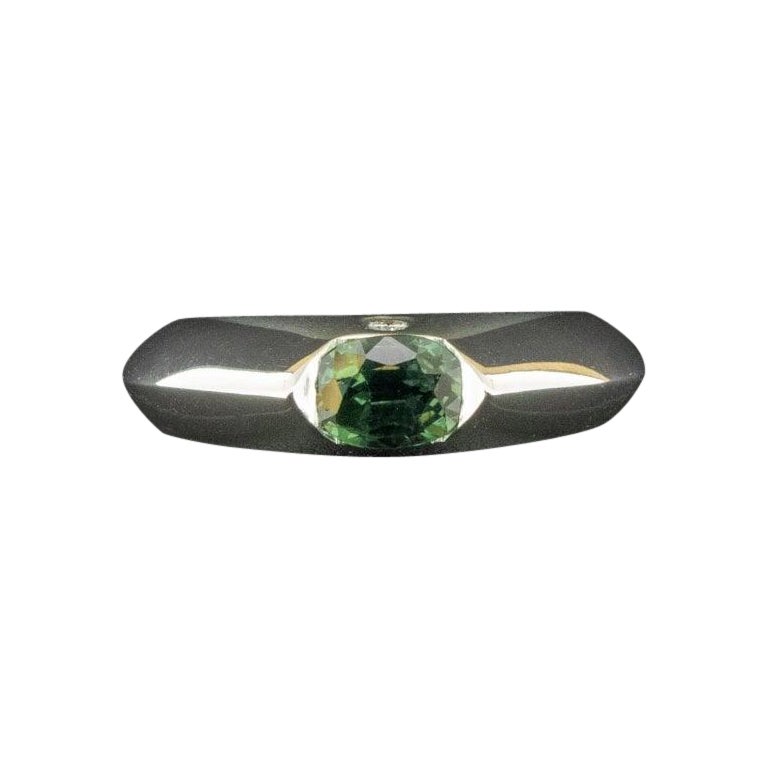 Condition: Good with mild/light scratches
Material: 18ct White Gold
Hallmarked: Yes, Full Piaget Hallmark
Main Stone Identity: Sapphire/Tourmaline
Main Stone Colour: Green
Main Stone Total Carat Weight: Approx. 0.80ct
Secondary Stone Identity: