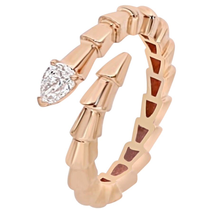 pear-cut diamond stylized bypass snake ring in 18kt rose gold For Sale