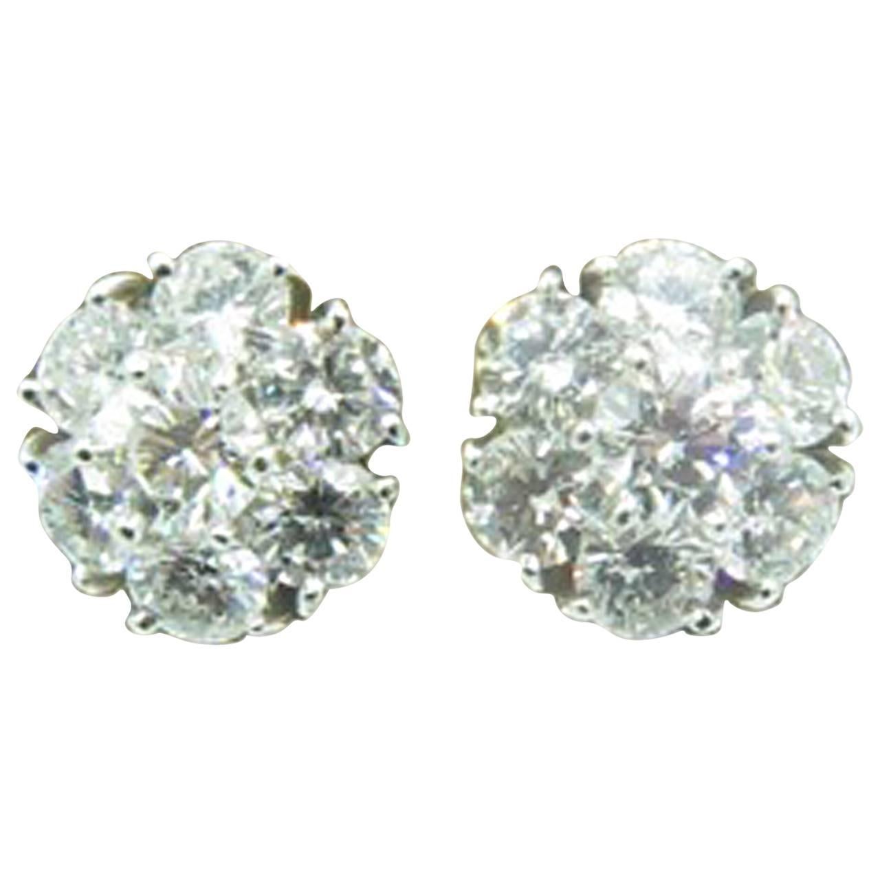 VAN CLEEF & ARPELS Diamond Fleurette Earrings.