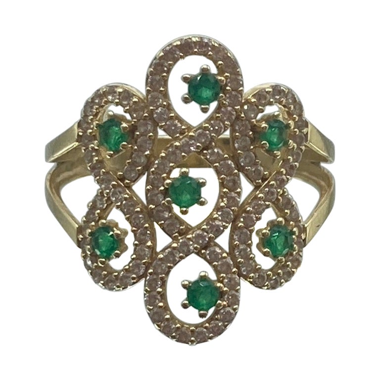 14K Yellow Gold, Green Stones and Cubic Zirconia Sones 2.6g Size: 7 For Sale