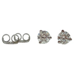 Boucles d'oreilles en or 14k avec diamants Approx. .47 Carat T.W. 0.6g