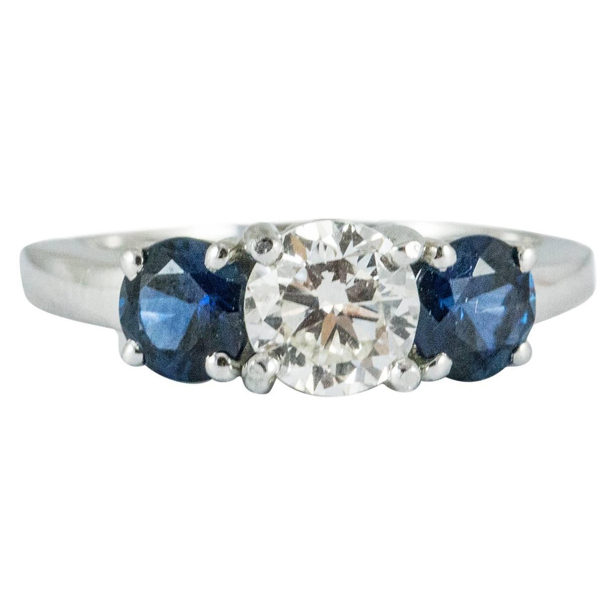 Platinum Sapphire and Diamond Three Stone Ring For Sale