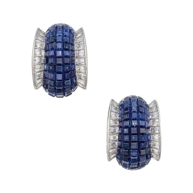 Van Cleef & Arpels pair of Sapphire and Diamond 'Mystery-Set' Earclips For Sale