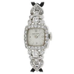 Vintage Movado Platin 1,5ctw Diamant Ausgefallenes Kleid Armbanduhr mit schwarzem Kordelriemen, Vintage