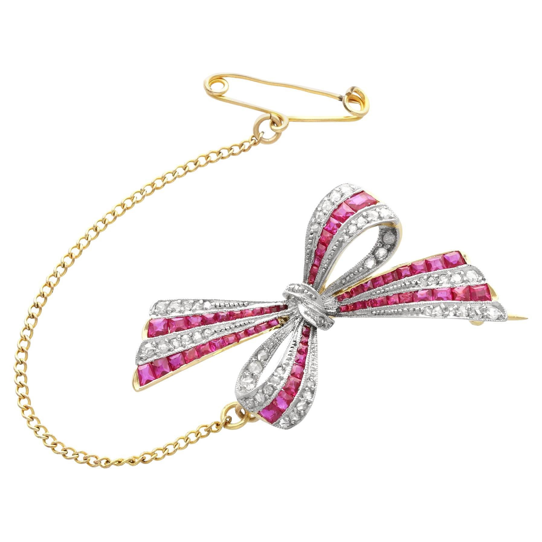 Antique 0.78Ct Ruby and 0.40Ct Diamond 18k Yellow Gold Bow Brooch Circa 1910 For Sale
