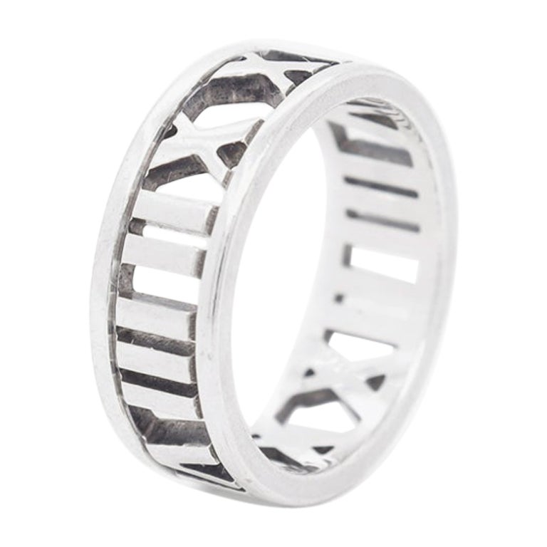 Tiffany and Co. Atlas Roman Numeral Sterling Silver Band Ring For Sale at  1stDibs | tiffany roman numeral ring, roman numeral ring tiffany, tiffany  ring roman numerals